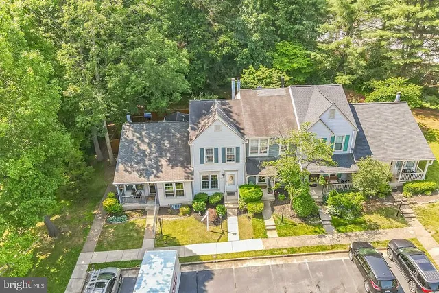 aerial view of a house with a garden and plants
