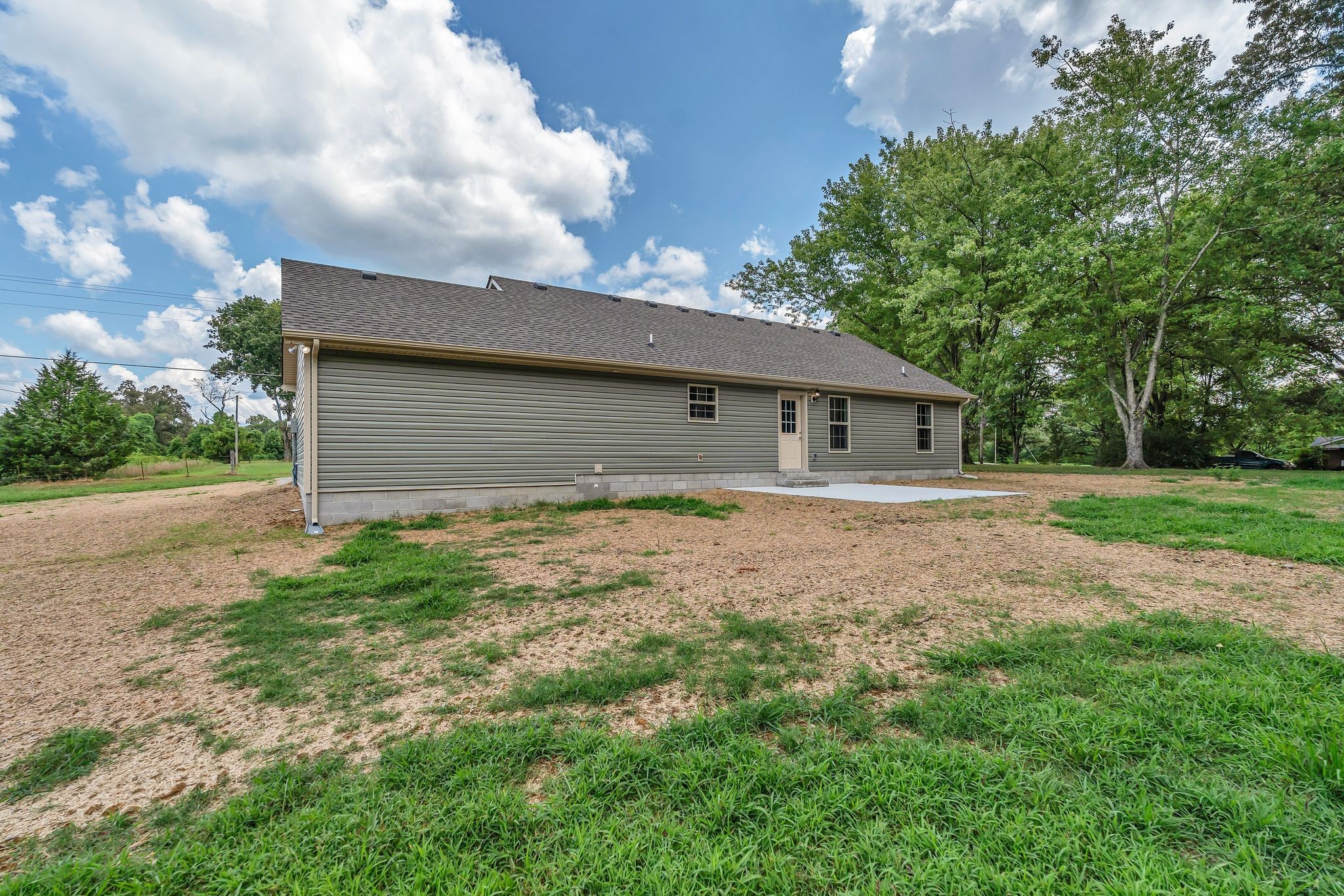 393 Flowertown Road Normandy, TN 37360 - Photo 32 of 34 a front view of house with yard and green space