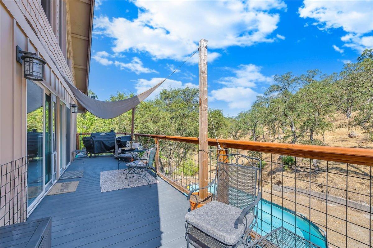 1499 Sawmill Road, Unit 594 Copperopolis, CA 95228 - Photo 13 of 98 Enjoy the rear deck with views of the hills, seasonal pond.