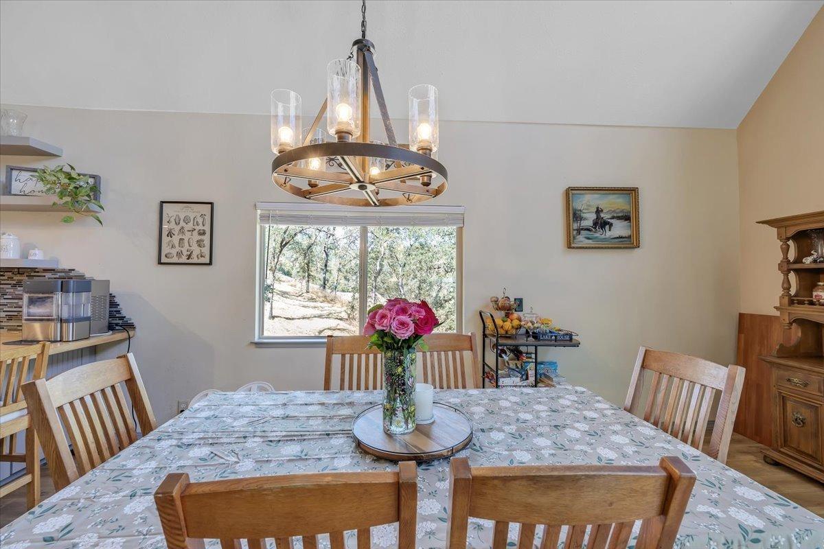 1499 Sawmill Road, Unit 594 Copperopolis, CA 95228 - Photo 21 of 98 The dining area features a great country-style chandelier.