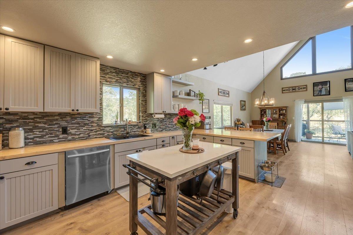 1499 Sawmill Road, Unit 594 Copperopolis, CA 95228 - Photo 37 of 98 Heading back through the expansive kitchen.