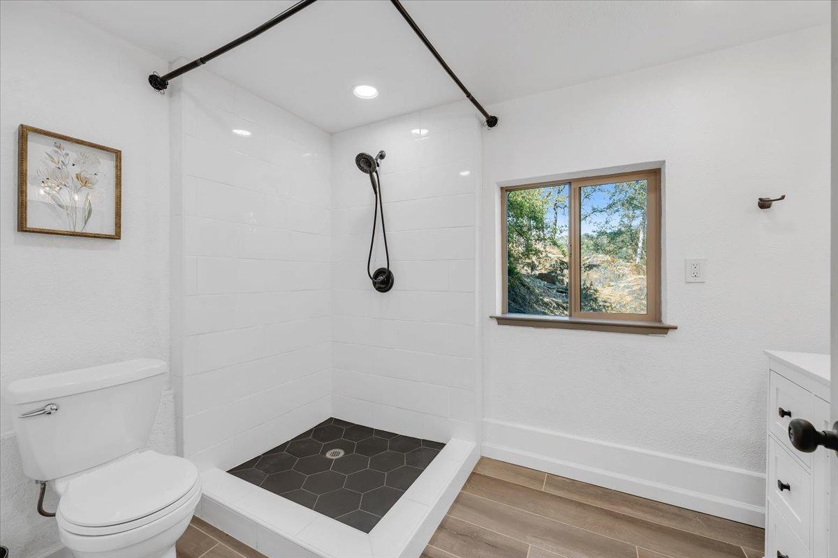 1499 Sawmill Road, Unit 594 Copperopolis, CA 95228 - Photo 50 of 98 Beautifully remodeled full bath with huge, tiled shower and stone-topped vanity.