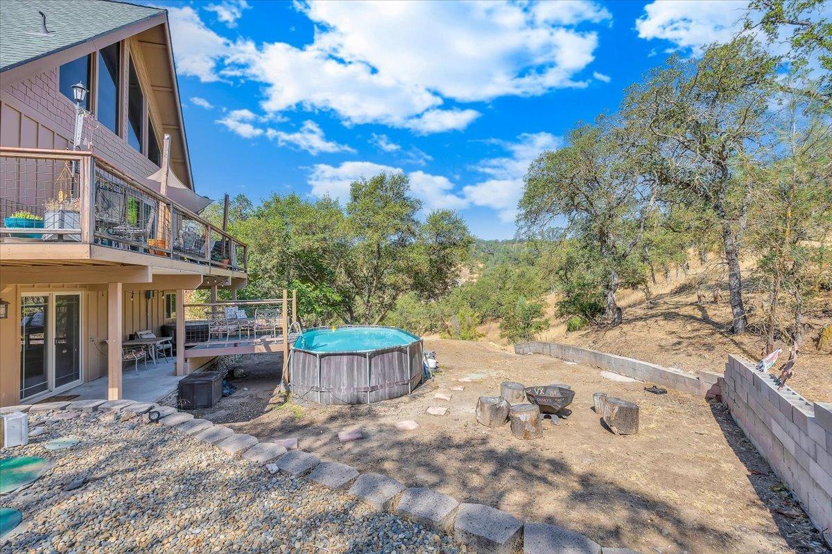 1499 Sawmill Road, Unit 594 Copperopolis, CA 95228 - Photo 57 of 98 A level area is perfect to add your firepit, and now features a covered pergola. Add a fountain, or whatever your heart desires.