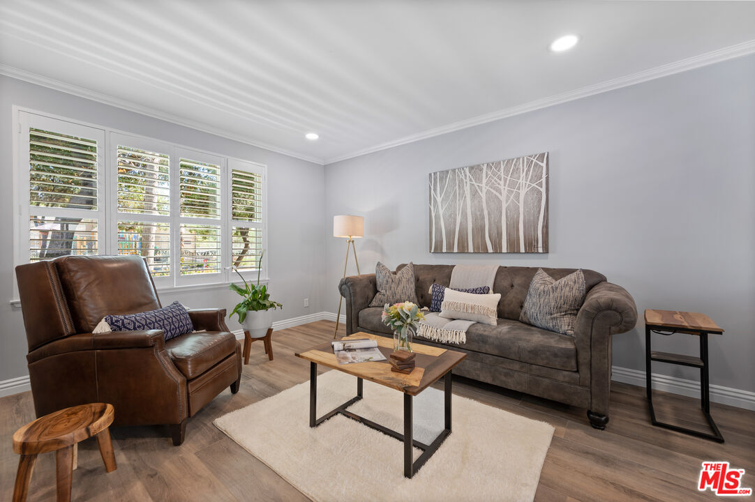 591 Garfield Avenue, Unit 5 Pasadena, CA 91101 - Photo 3 of 48 a living room with furniture and a large window