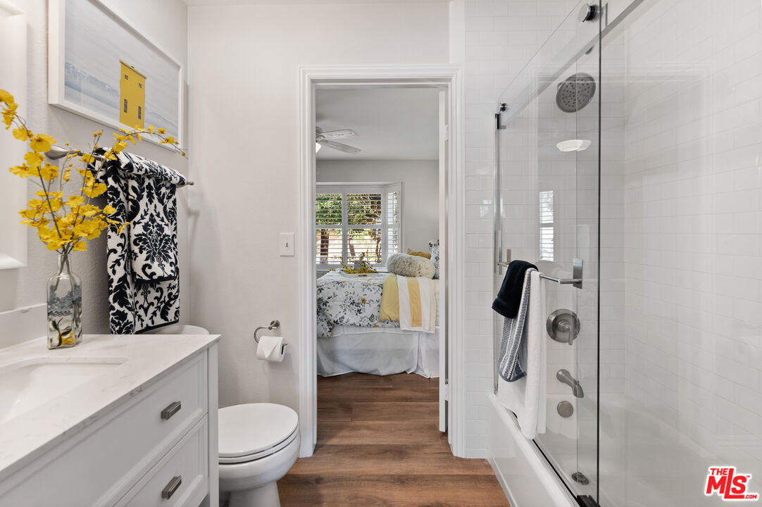 591 Garfield Avenue, Unit 5 Pasadena, CA 91101 - Photo 34 of 48 a bathroom with a toilet sink and shower