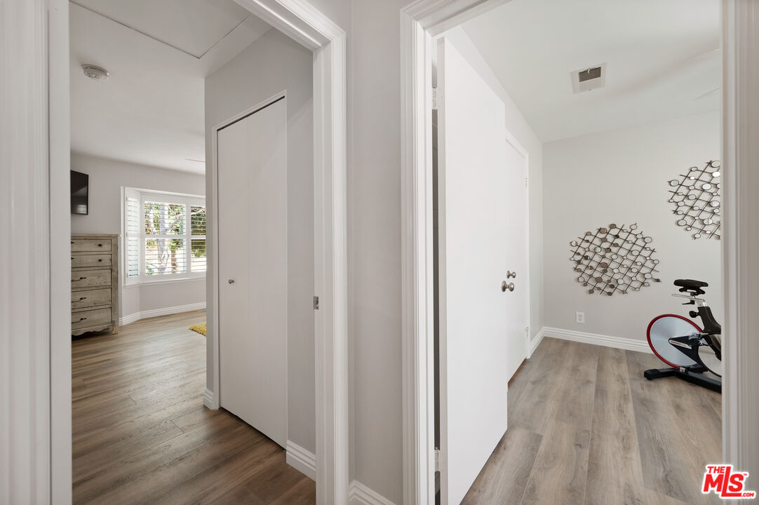 591 Garfield Avenue, Unit 5 Pasadena, CA 91101 - Photo 41 of 48 a view of a hallway with wooden floor