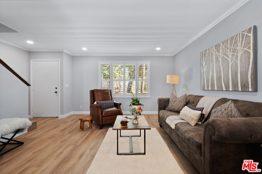 591 Garfield Avenue, Unit 5 Pasadena, CA 91101 - Photo 6 of 48 a living room with furniture and a window