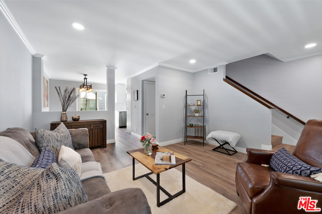 591 Garfield Avenue, Unit 5 Pasadena, CA 91101 - Photo 7 of 48 a living room with furniture and wooden floor