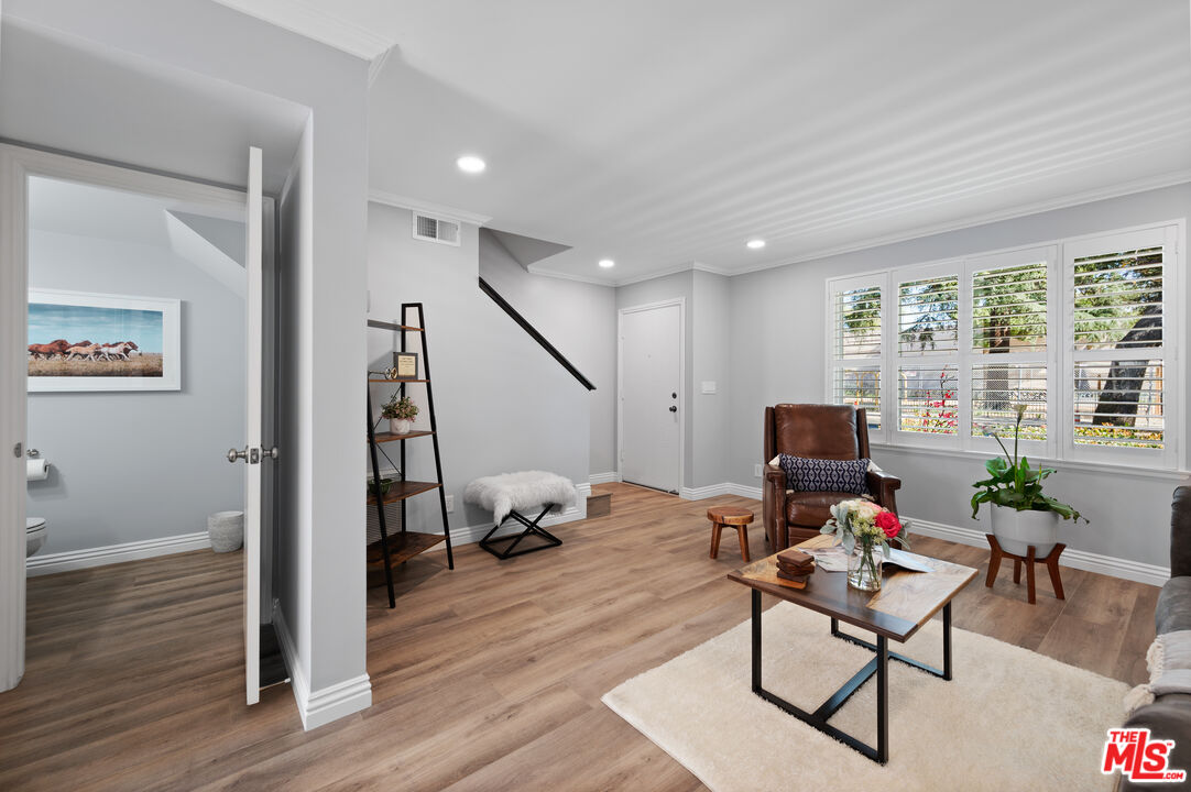 591 Garfield Avenue, Unit 5 Pasadena, CA 91101 - Photo 9 of 48 a view of a livingroom with workspace and a window