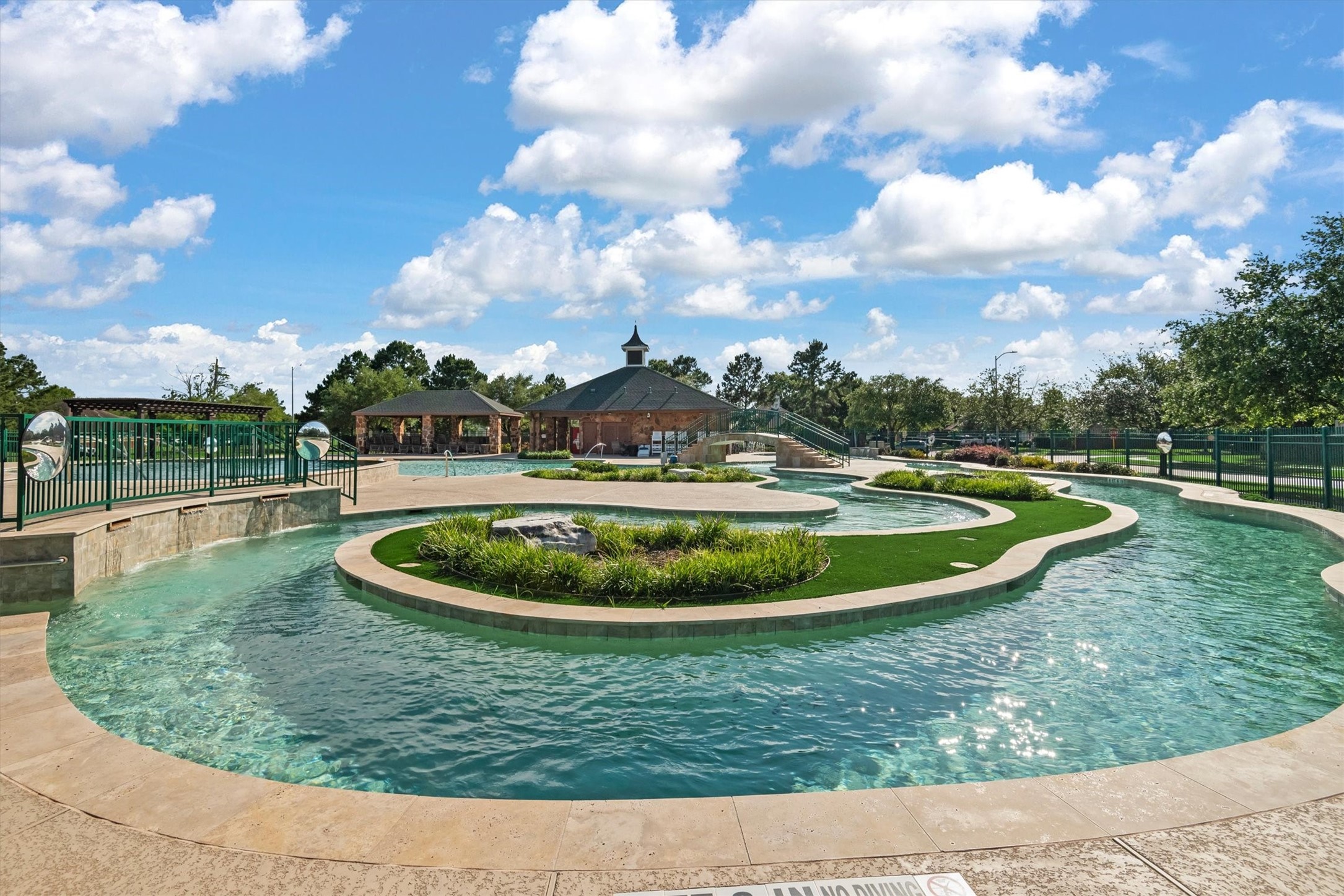 9406 Lochflora Drive Spring, TX 77379 - Photo 43 of 49 a view of a swimming pool with a yard