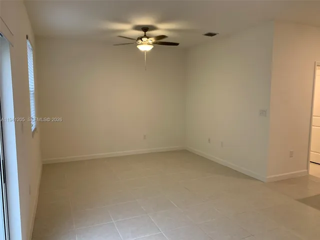 a view of a small space with a fan