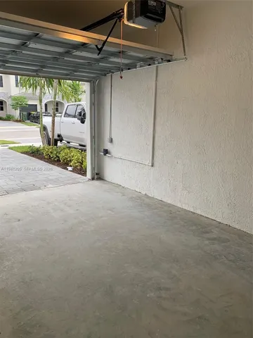 a view of a room with a large window