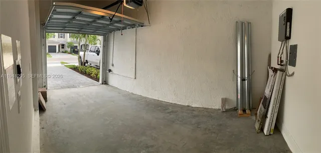 a view of a room with wooden walls