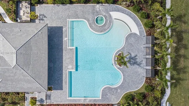 an aerial view of a highlighted house