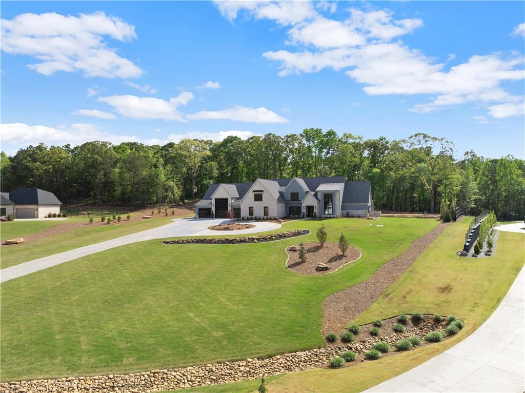 373 Fortress Way Jefferson, GA 30549 - Photo 11 of 118 a view of a swimming pool with an outdoor seating