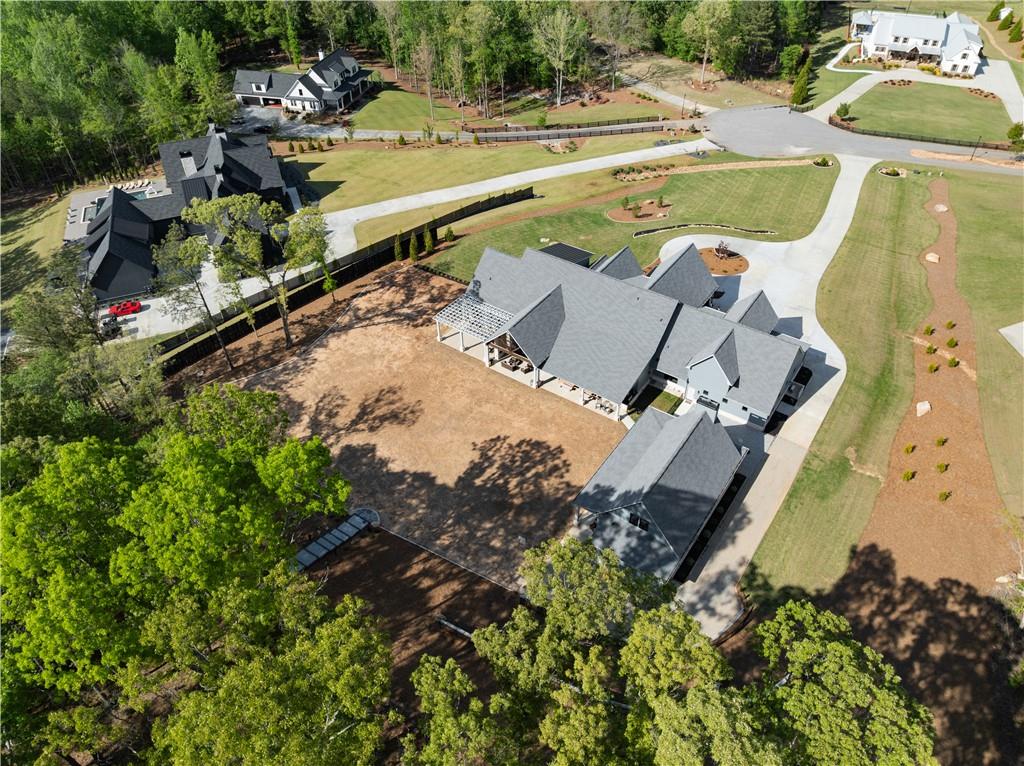 373 Fortress Way Jefferson, GA 30549 - Photo 112 of 118 an aerial view of a house with a swimming pool
