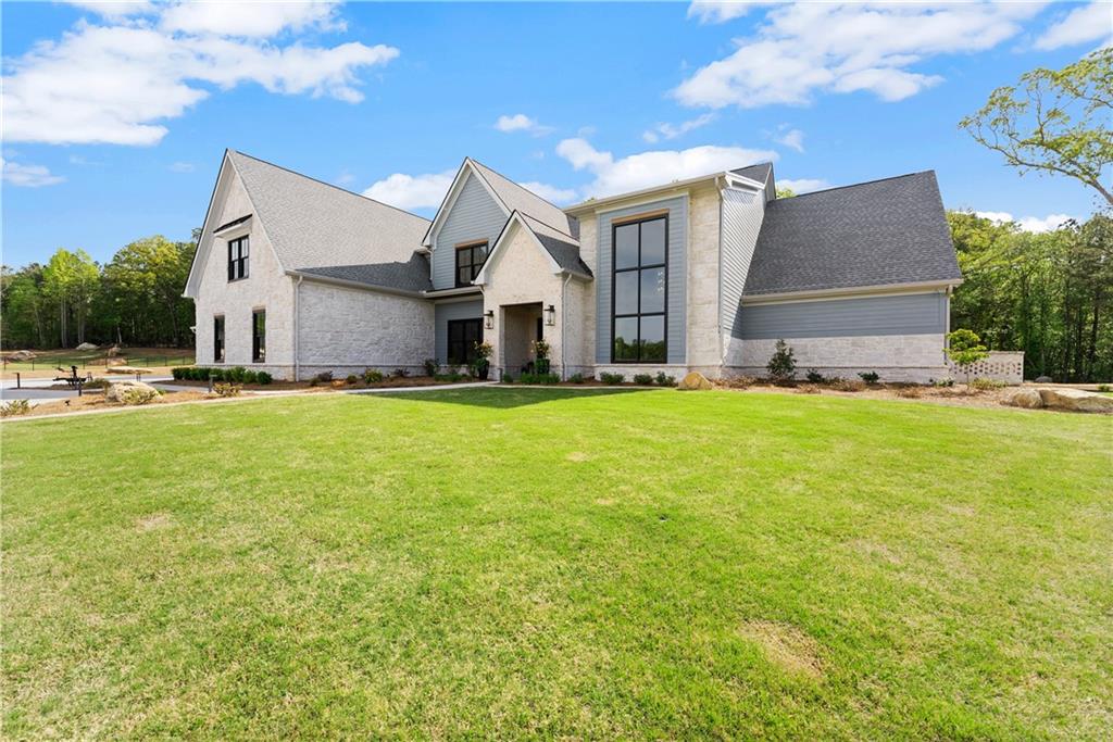 373 Fortress Way Jefferson, GA 30549 - Photo 5 of 118 a big house with a big yard and more windows