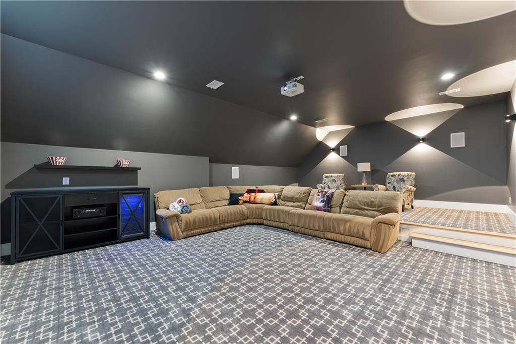 373 Fortress Way Jefferson, GA 30549 - Photo 63 of 118 a living room with furniture and a lamp
