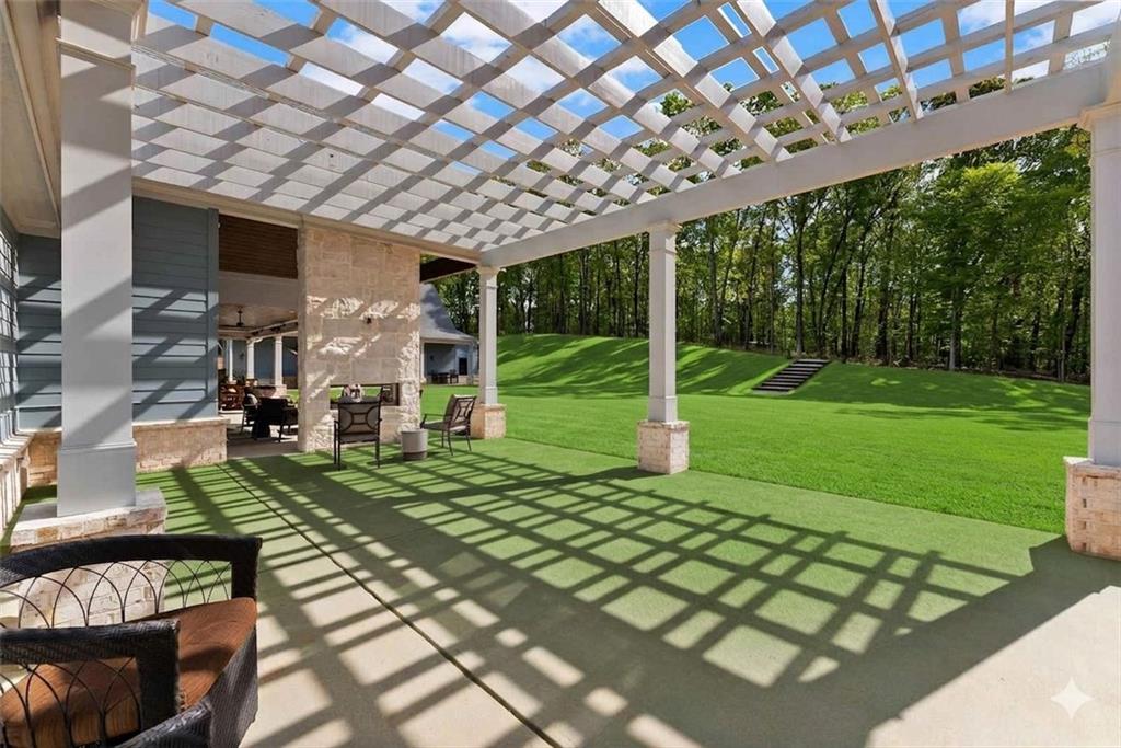 373 Fortress Way Jefferson, GA 30549 - Photo 96 of 118 a view of a porch with furniture and garden