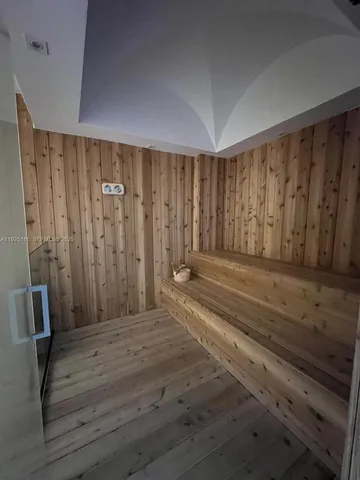 a view of empty room with shelves