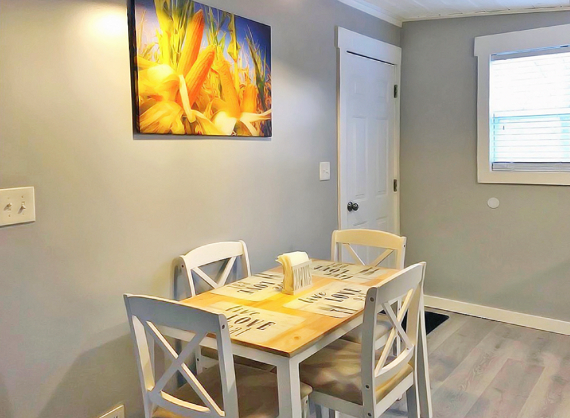 200 East Grove Street Utica, IL 61373 - Photo 19 of 41 a view of a dining room with a table and chairs