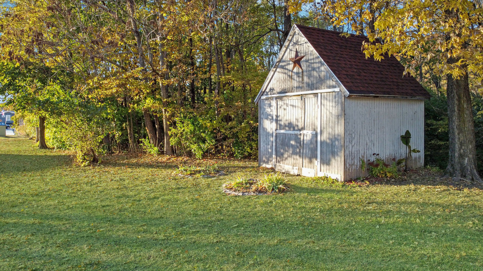 200 East Grove Street Utica, IL 61373 - Photo 20 of 41 a backyard of a house with yard and outdoor seating