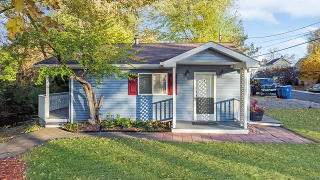 front view of a house with a yard