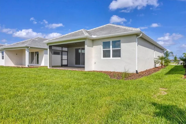a outdoor space with lots of furniture and a potted plant