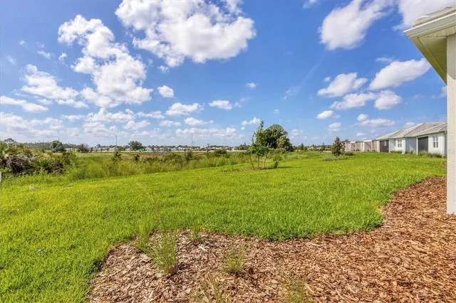 a view of a lake with a patio