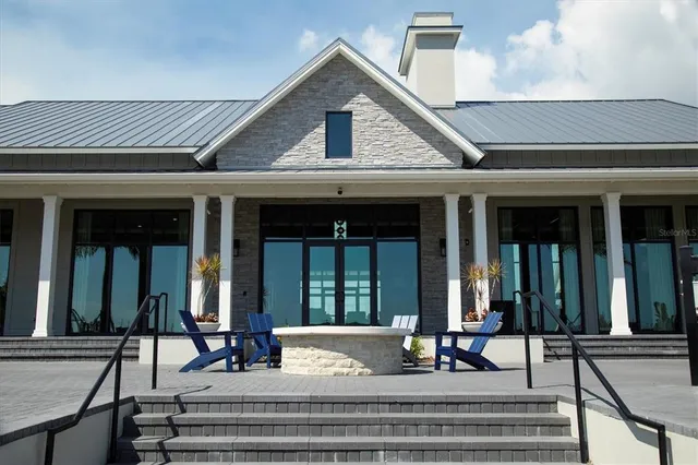a front view of a house with a ocean view