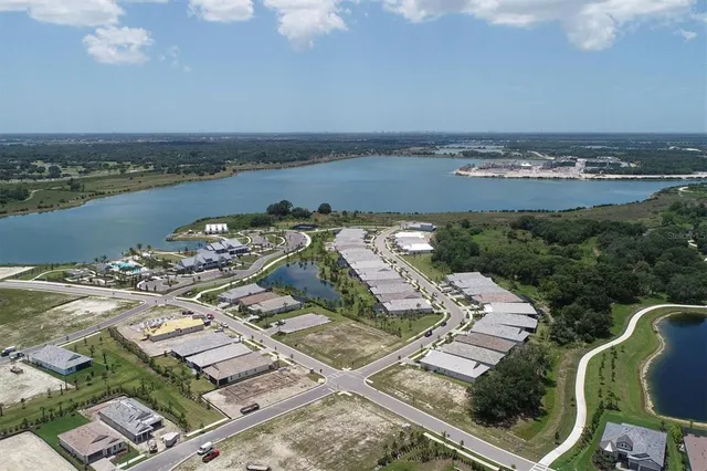 a view of a house with backyard and porch