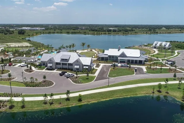 a dining room with furniture and chandelier