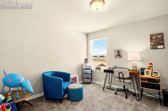 a view of an entryway with an empty room