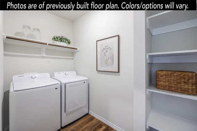 a bedroom with a bed and a table in it