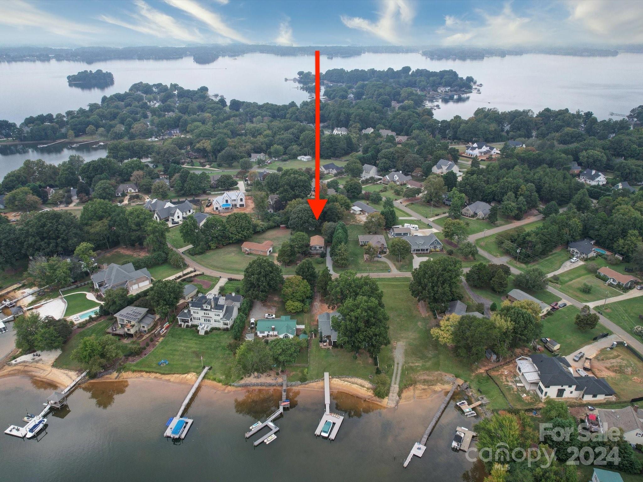 20126 Rainbow Circle Cornelius, NC 28031 - Photo 2 of 40 an aerial view of a houses with a street