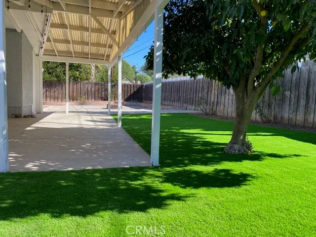 a view of backyard with green space