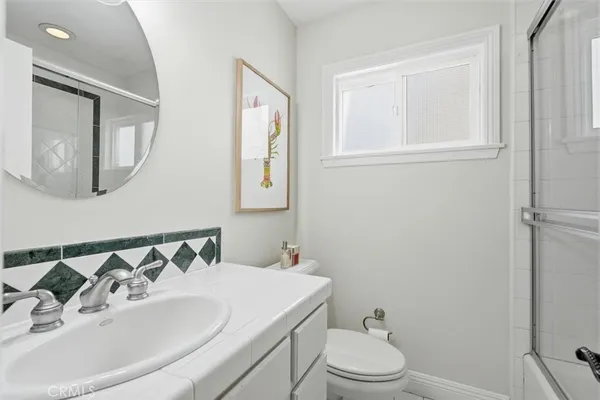 a bathroom with a sink and a toilet