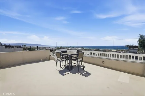 a view of a terrace with sitting area