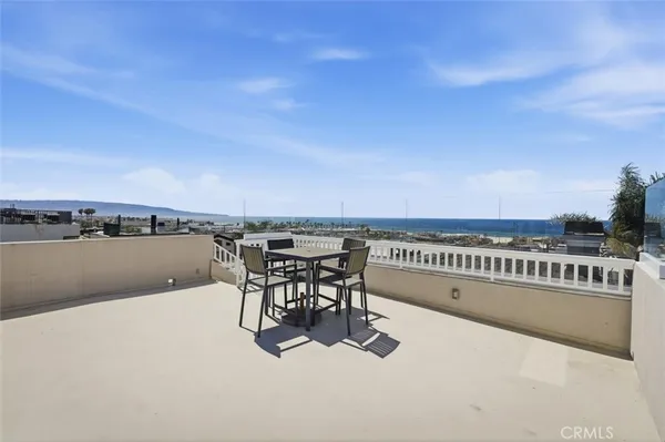 a view of a terrace with sitting area