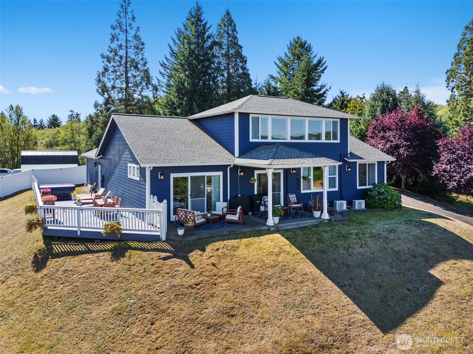 1480 Pacific Avenue Raymond, WA 98577 - Photo 1 of 40 a view of a house with swimming pool and sitting area