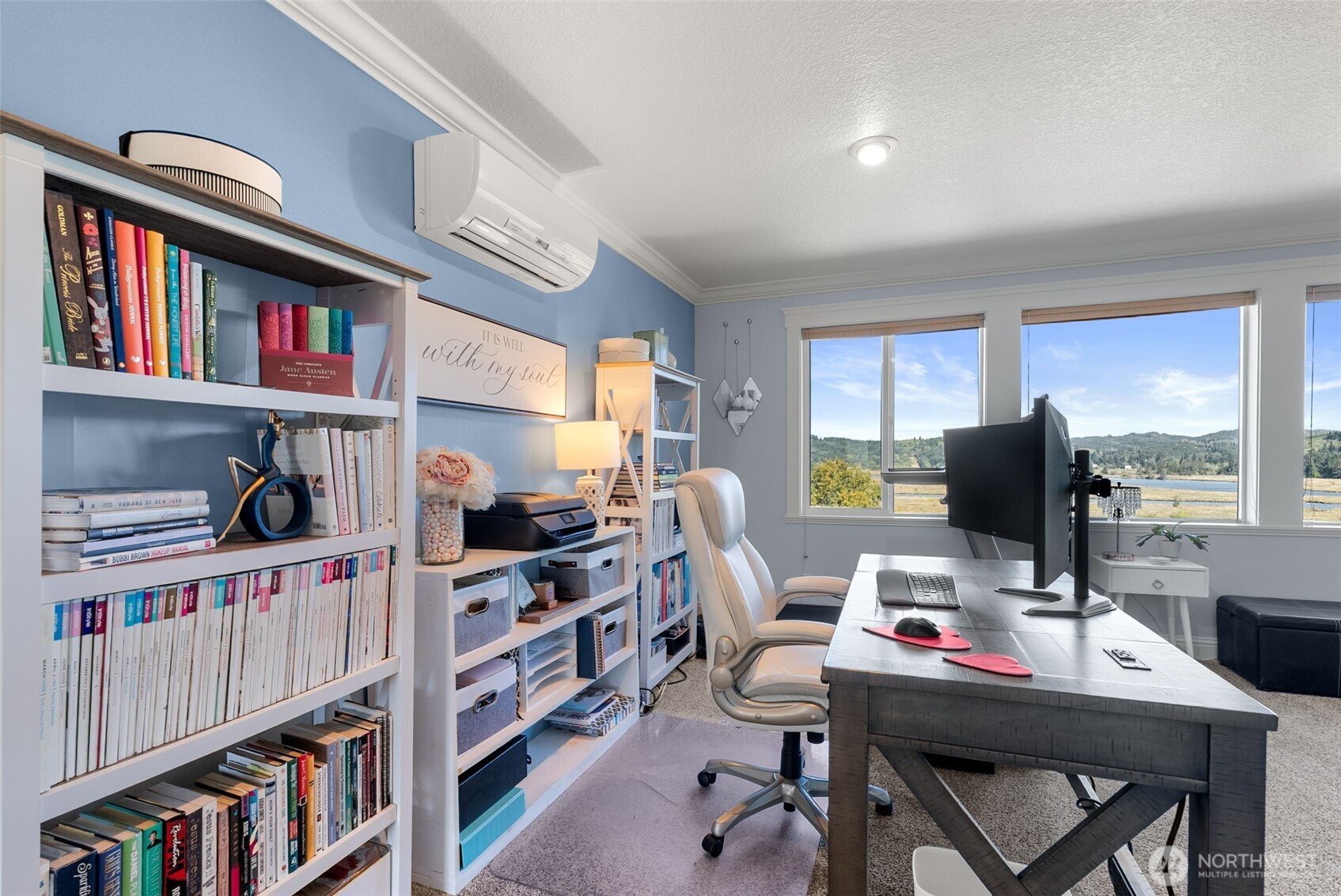 1480 Pacific Avenue Raymond, WA 98577 - Photo 26 of 40 a work room with furniture and a book shelf
