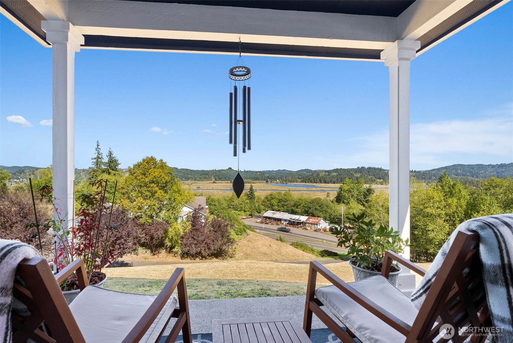 1480 Pacific Avenue Raymond, WA 98577 - Photo 34 of 40 a view of a balcony with chair and table