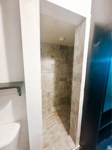 393 Old Mill Road Glenwood, UT 84730 - Photo 8 of 10 Tiled shower stall featuring a ceiling-mounted showerhead