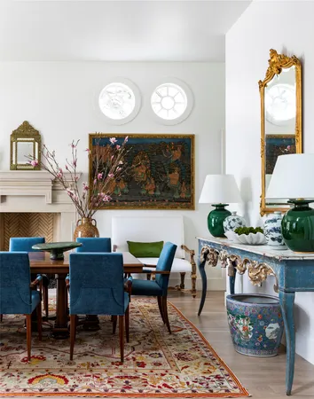 a view of a dining room with furniture and a rug
