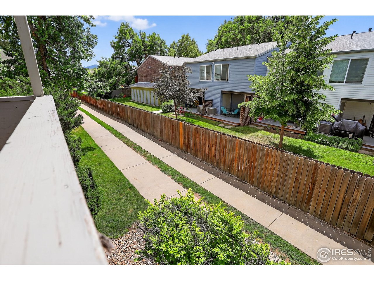 3535 28th Street, Unit 202 Boulder, CO 80301 - Photo 15 of 31 a view of a house with wooden deck
