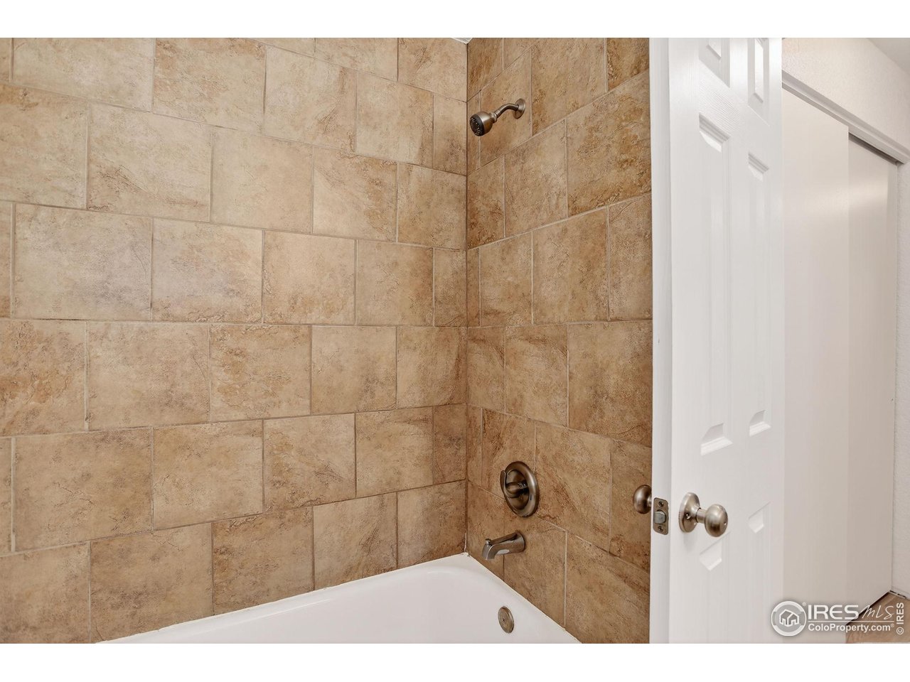 3535 28th Street, Unit 202 Boulder, CO 80301 - Photo 21 of 31 a bathroom with a shower