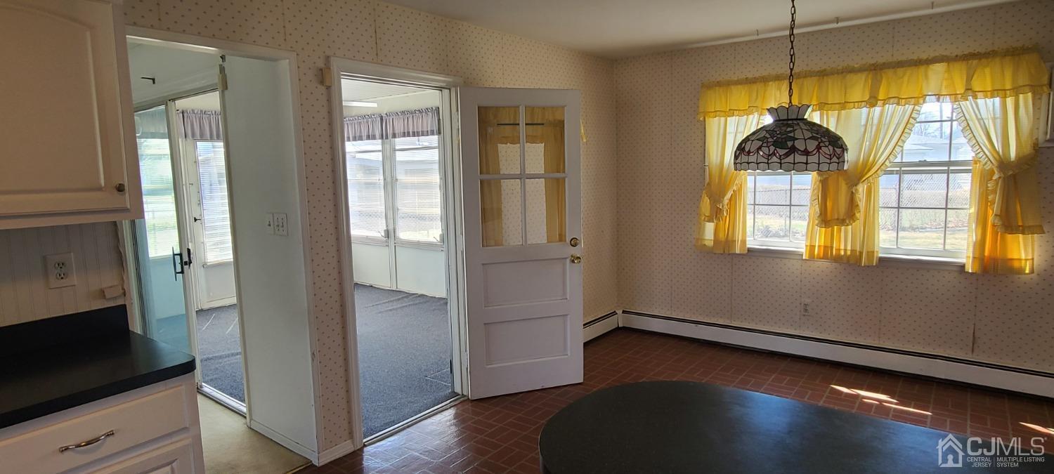 3 Stiles Road Edison, NJ 08817 - Photo 28 of 30 a room with window and wooden floor