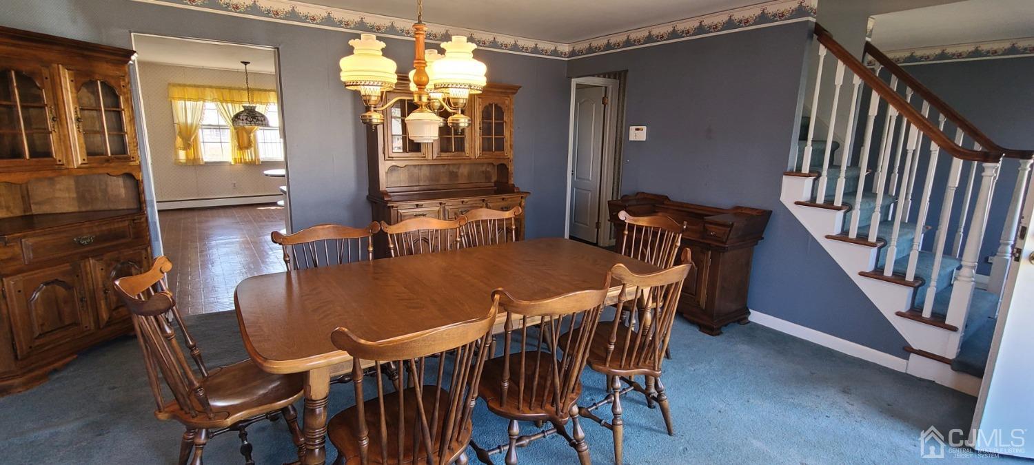 3 Stiles Road Edison, NJ 08817 - Photo 4 of 30 a dining room with furniture and window