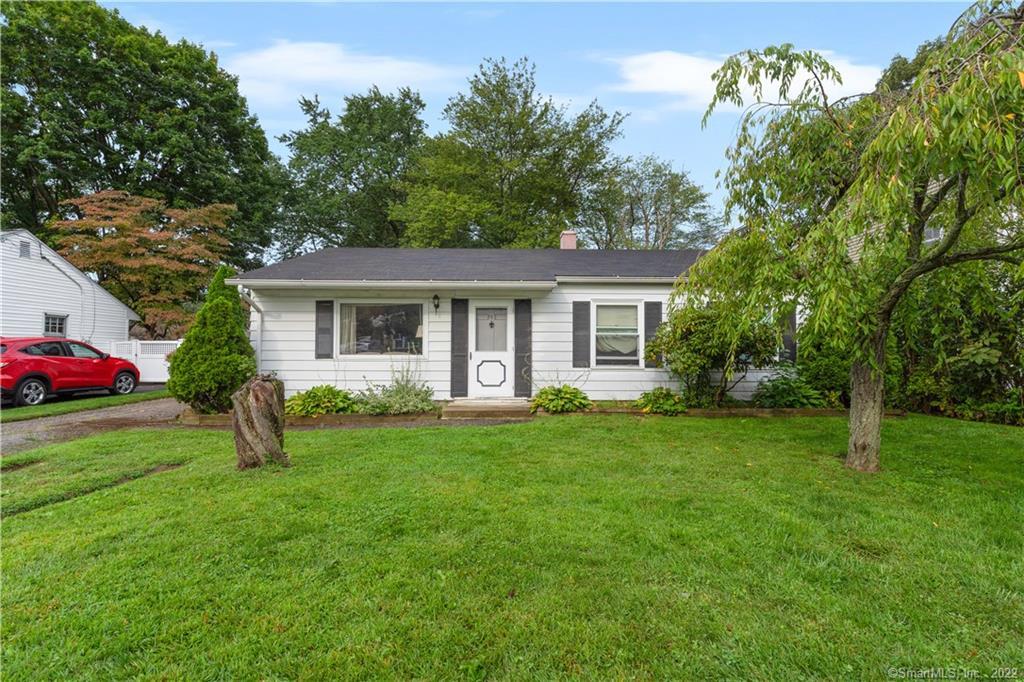 a house view with a garden space