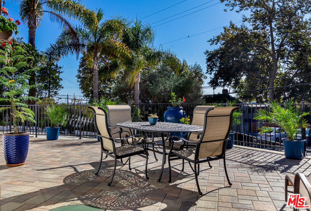 3938 Las Flores Canyon Road Malibu, CA 90265 - Photo 2 of 21 a view of an outdoor space with a table and chairs